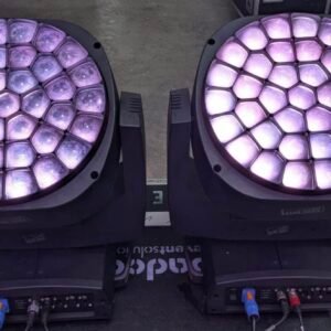 Two Claypaky A.leda B-Eye K20 LED moving head fixtures illuminated purple