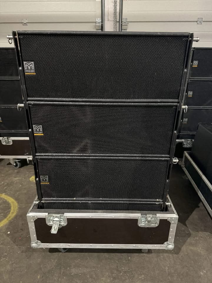Martin Audio W8LM line array loudspeakers on a transport case
