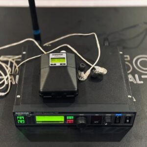 Shure PSM900 P9T transmitter with a P9RA+ receiver and earphones pictured