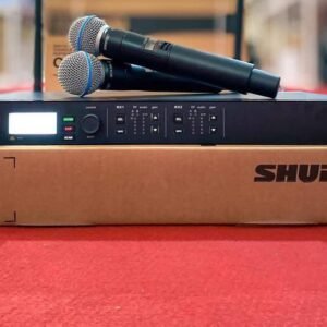 Shure ULXD4D receiver and Beta 58A handheld microphones pictured